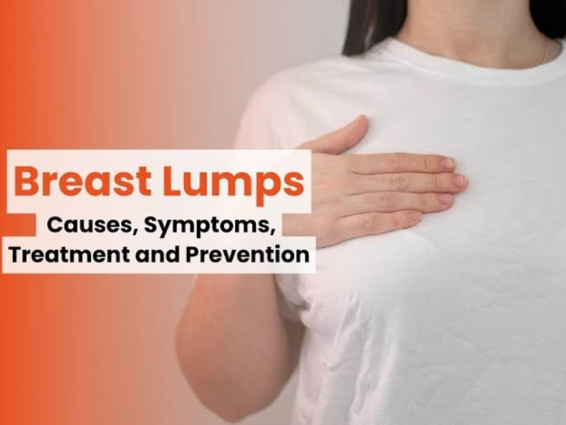 Woman checking her breast for a lump